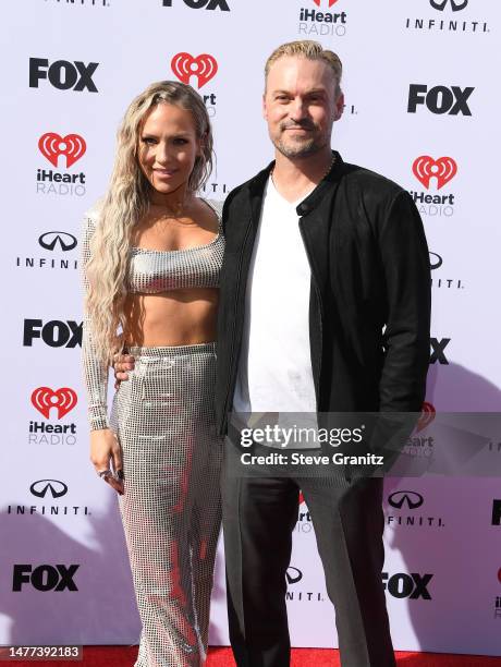 Sharna Burgess, Brian Austin Green arrives at the 2023 iHeartRadio Music Awards at Dolby Theatre on March 27, 2023 in Hollywood, California.