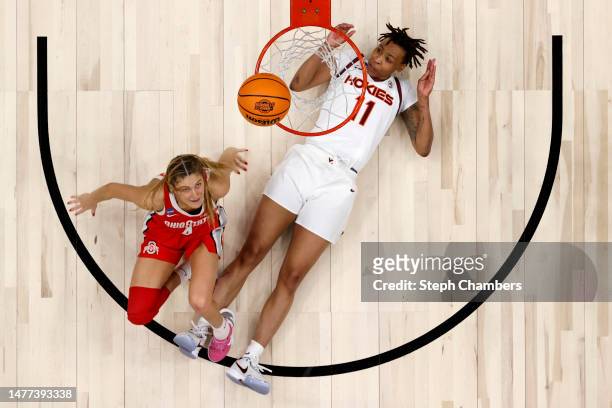 Jacy Sheldon of the Ohio State Buckeyes watches her shot against D'asia Gregg of the Virginia Tech Hokies in the Elite Eight round at Climate Pledge...