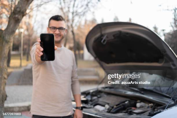 calling roadside assistance - aa stock pictures, royalty-free photos & images