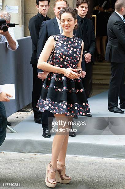 Marion Cotillard arrives at the Christian Dior Haute-Couture Show as part of Paris Fashion Week Fall / Winter 2013 on July 2, 2012 in Paris, France.