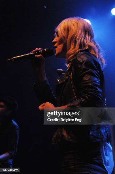 Emily Haines of Metric performs on stage at Shepherds Bush Empire on July 2, 2012 in London, England.