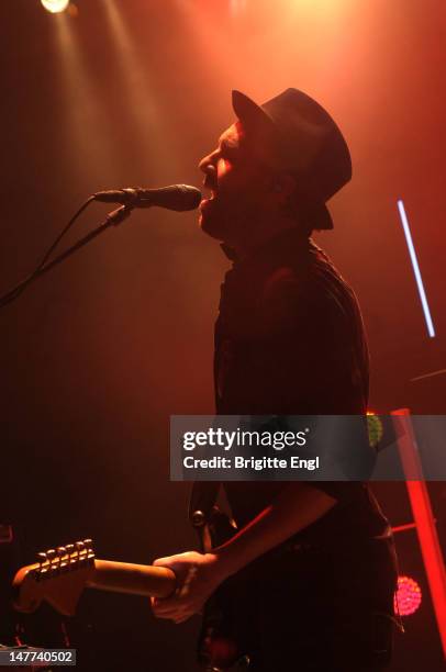 James Shaw of Metric performs on stage at Shepherds Bush Empire on July 2, 2012 in London, England.