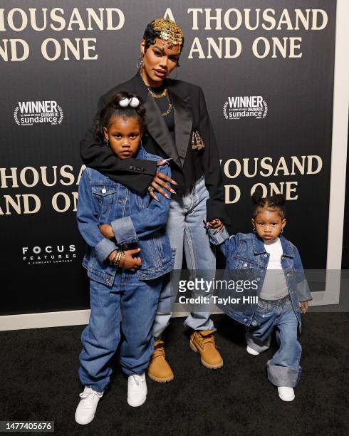 Iman Tayla Shumpert Jr., Teyana Taylor, and Rue Rose Shumpert attend the New York premiere of Focus Features' "A Thousand and One" at AMC Magic...