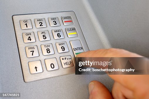 ATM, entering Pin code ATM, entering Pin code
