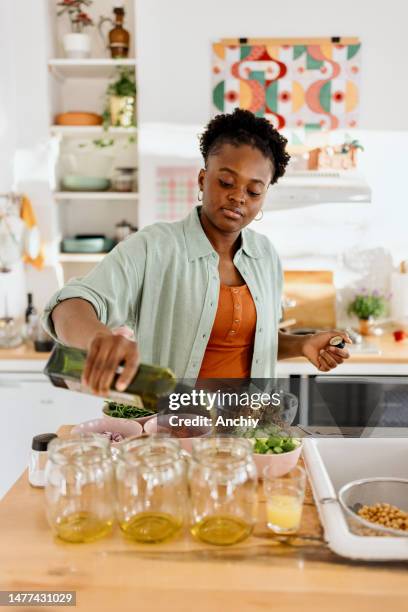 woman preparing a tasty salad in a jar - freshers week stock pictures, royalty-free photos & images