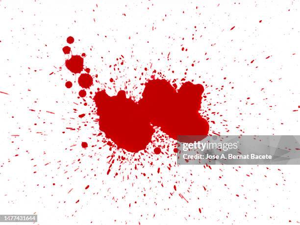 full frame of drops and splashes of red paint on a white background - splatter stock pictures, royalty-free photos & images