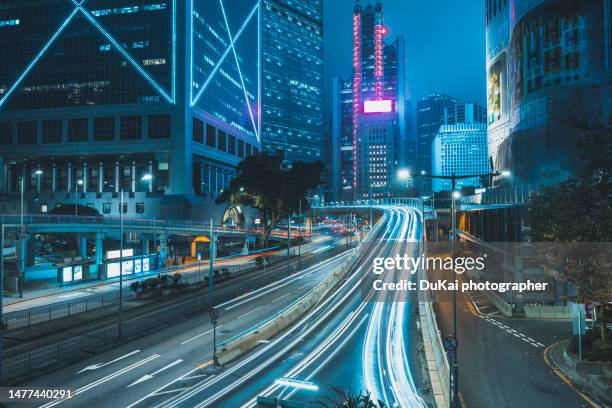 night in central hong kong - stock market trading floor stock pictures, royalty-free photos & images