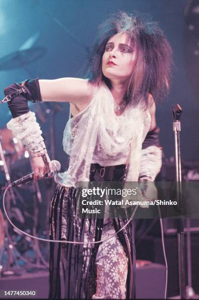 Siouxsie Sioux of Siouxsie and the Banshees performs on stage at Hammersmith Odeon, London, 28th December 1982.