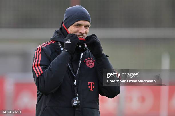 Head coach Thomas Tuchel of FC Bayern München smiles during a training session at Saebener Strasse training ground on March 28, 2023 in Munich,...