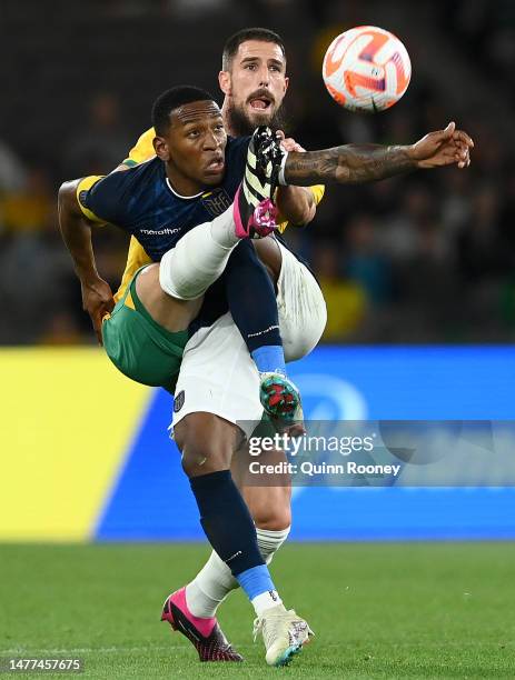 Milos Degenek of the Socceroos and Pervis Estupiñan of Ecuador compete for the ball during the International Friendly match between the Australia...