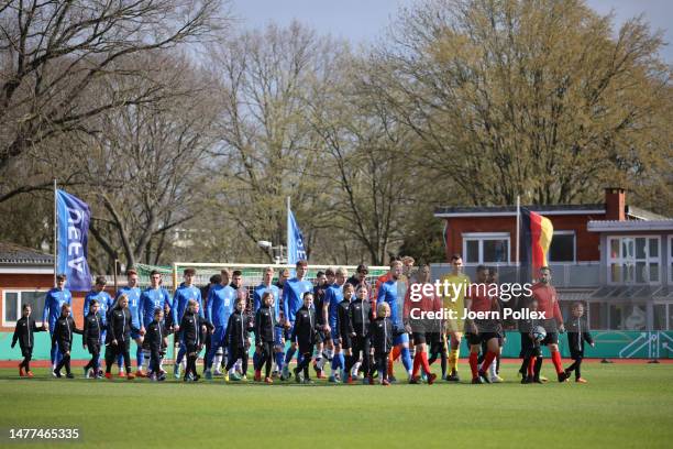 Both teams enter the pitch before the UEFA European Under-19 Championship Malta 2023 qualifying match between Slovenia and Germany at Weserstadion...