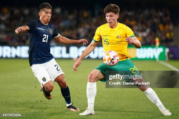 Jordan Bos of the Socceroos and Alan Franco of Ecuador contest the ball during the International Friendly match between the Australia Socceroos and...