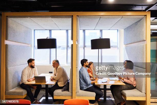 diverse businesspeople working in cubicles in a modern office - corporate modern office bright diverse imagens e fotografias de stock