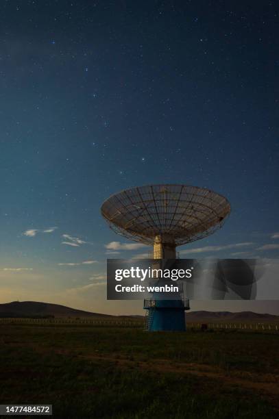 the big dipper in the constellation ursa major is just above the satellite antenna - アンテナ ストックフォトと画像