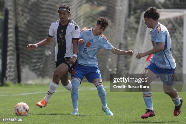 Eric Da Silva Moreira of Germany in action with Marc Guiu of Spain during the European U17 Championship qualifier match between U17 Spain and U17...