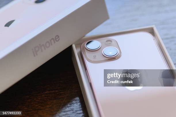 brand new iphone 13 mini pink - apple store interior stock pictures, royalty-free photos & images