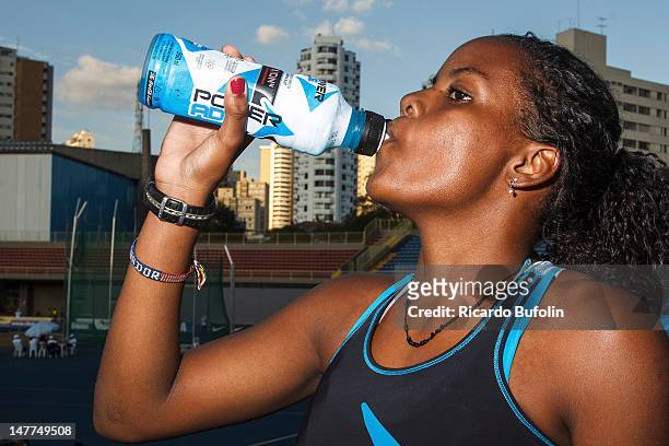 Brazilian Dandadeua Asteria de Souza, drinks from a bottle after the Womens 400 meters Event during the second day of the Trofeu Brazil/Caixa 2012...