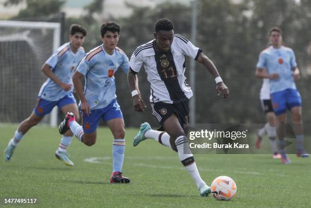 Germany's Charles Hermann is in action with Spain's Pau Cubarsi during the European U17 Championship qualifier match between U17 Spain and U17...