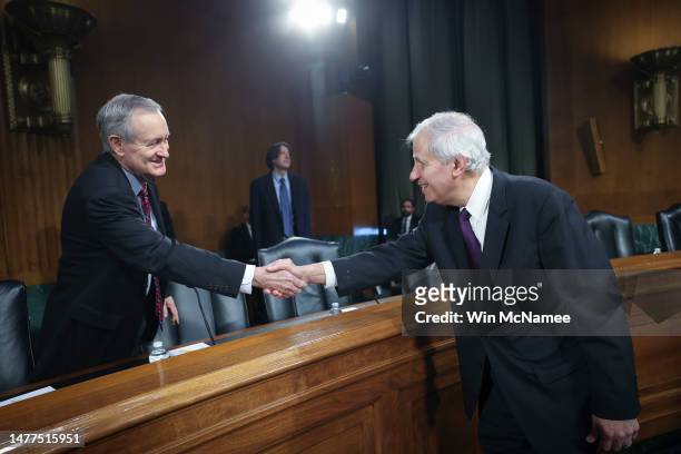 Federal Deposit Insurance Corporation Chairman Martin J. Gruenberg greets Sen. Mike Crapo prior to testimony before the Senate Banking, Housing and...