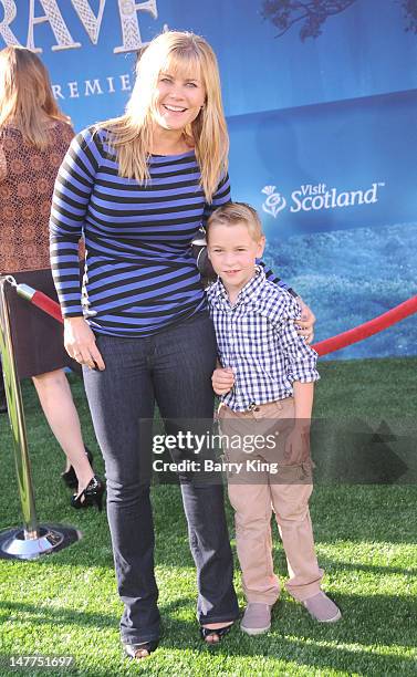 Actress Alison Sweeney and her son Benjamin Edward Sanov arrive at the "Brave" premiere during the 2012 Los Angeles Film Festival held at Dolby...