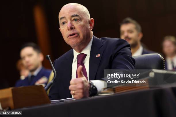 Secretary of Homeland Security Alejandro Mayorkas testifies before the Senate Homeland Security and Governmental Affairs Committee on March 28, 2023...