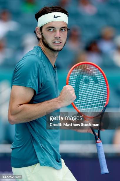 Taylor Fritz celebrates while playing Holger Rune of Denmark during the Miami Open at Hard Rock Stadium on March 28, 2023 in Miami Gardens, Florida.