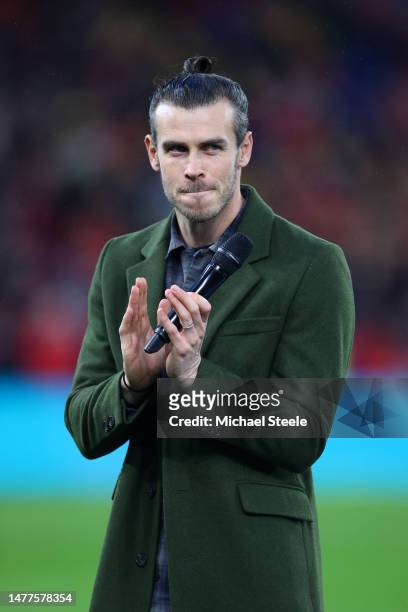 Former Wales player Gareth Bale acknowledges the fans prior to the UEFA EURO 2024 qualifying round group D match between Wales and Latvia at Cardiff...