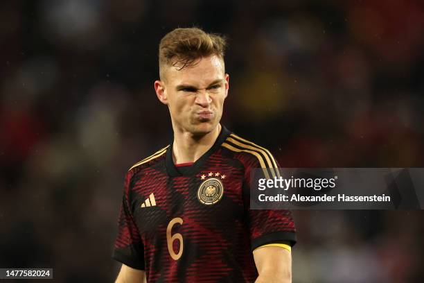 Joshua Kimmich of Germany reacts during the international friendly match between Germany and Belgium at RheinEnergieStadion on March 28, 2023 in...