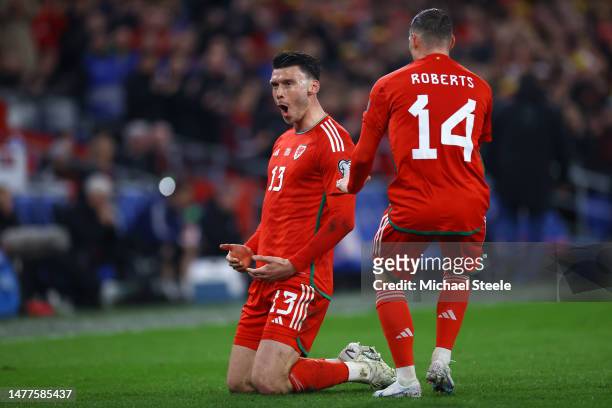 Kieffer Moore of Wales celebrates after scoring the team's first goal during the UEFA EURO 2024 qualifying round group D match between Wales and...