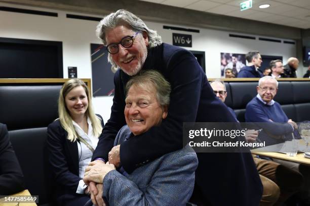 Karl-Heinz Thieleno and Toni Schumacher interact during the Club Of Former National Players Meeting at RheinEnergieStadion on March 28, 2023 in...