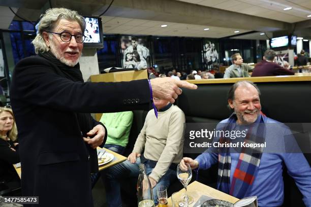 Toni Schumacher and Herbert Zimmermann d interact during the Club Of Former National Players Meeting at RheinEnergieStadion on March 28, 2023 in...