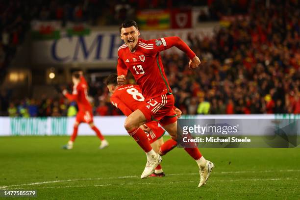 Kieffer Moore of Wales celebrates after scoring the team's first goal during the UEFA EURO 2024 qualifying round group D match between Wales and...