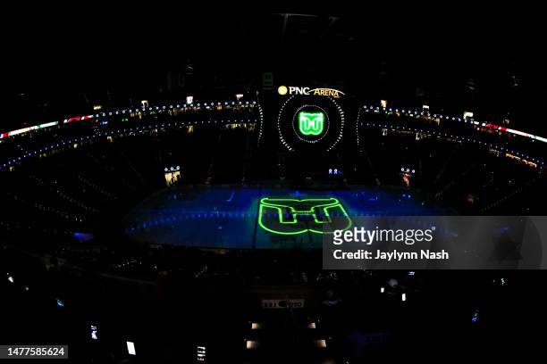 Carolina Hurricanes celebrates Whalers Night during the first period of the game against the Boston Bruins at PNC Arena on March 26, 2023 in Raleigh,...
