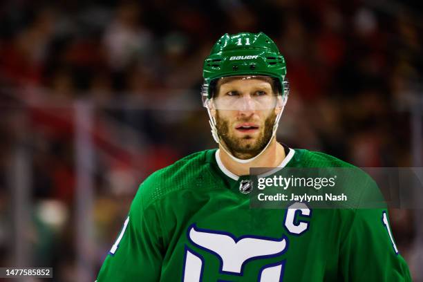 Jordan Staal of the Carolina Hurricanes looks on during the third period of the game against the Boston Bruins at PNC Arena on March 26, 2023 in...