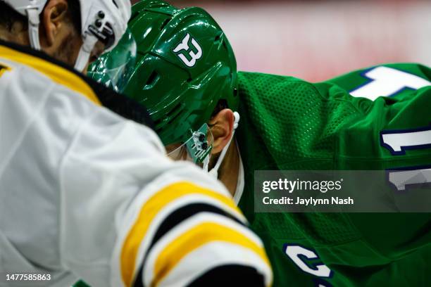 Jordan Staal of the Carolina Hurricanes Whalers helmet during the third period of the game against the Boston Bruins at PNC Arena on March 26, 2023...