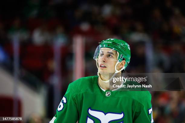 Brady Skjei of the Carolina Hurricanes looks on during the third period of the game against the Boston Bruins at PNC Arena on March 26, 2023 in...