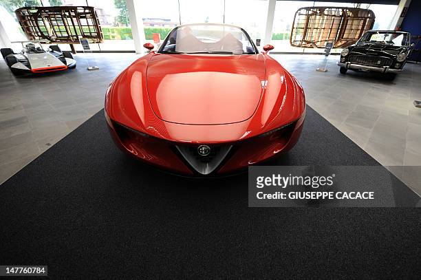 This file picture taken on May 21, 2010 in Cambiano near Turin shows an Alfa Romeo is displayed in the Pininfarina Museum during the 80th anniversary...