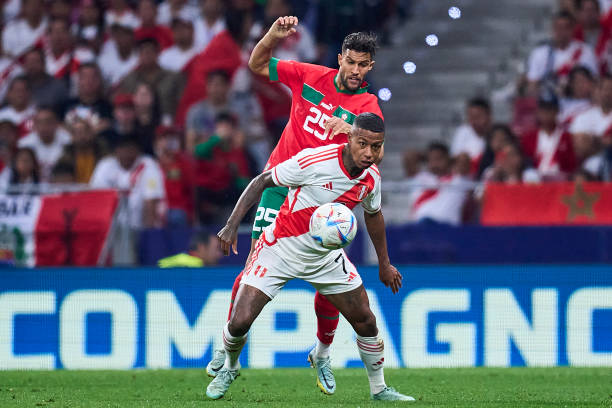 Yahya Attiat Allah of Morocco competes for the ball with Andy Polo of Peru during the international friendly game between Morocco and Peru at Civitas...
