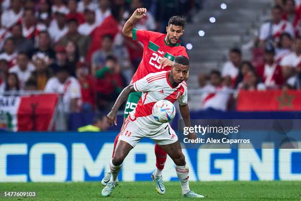 Yahya Attiat Allah of Morocco competes for the ball with Andy Polo of Peru during the international friendly game between Morocco and Peru at Civitas...
