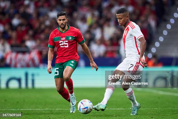 Andy Polo of Peru being followed by Yahya Attiat Allah mof Morocco during the international friendly game between Morocco and Peru at Civitas...