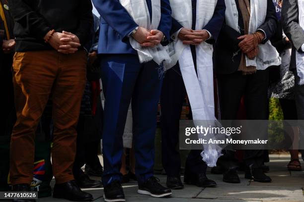 Activists listen during a bipartisan press conference on Tibetan Rights outside the U.S. Capitol Building on March 28, 2023 in Washington, DC....