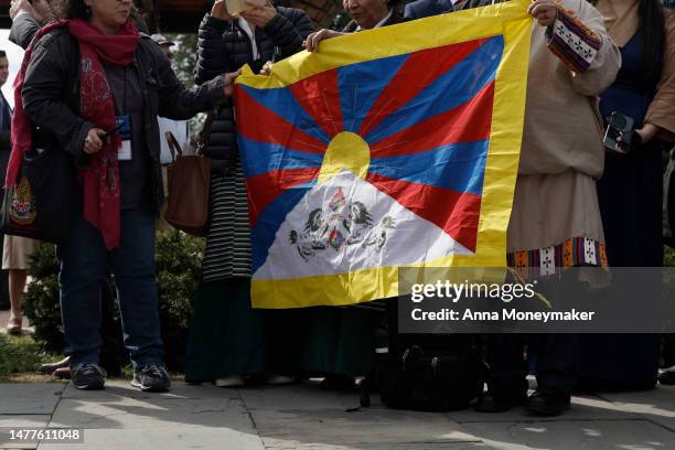 Activists listen during a bipartisan press conference on Tibetan Rights outside the U.S. Capitol Building on March 28, 2023 in Washington, DC....