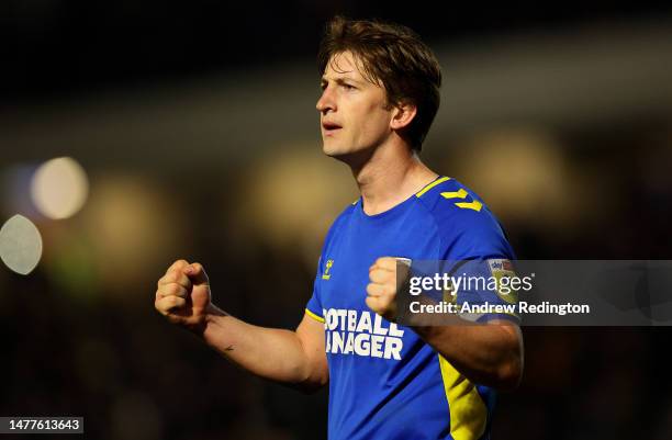 Alex Woodyard of AFC Wimbledon celebrates victory at the end of the Sky Bet League Two match between AFC Wimbledon and Walsall at The Cherry Red...
