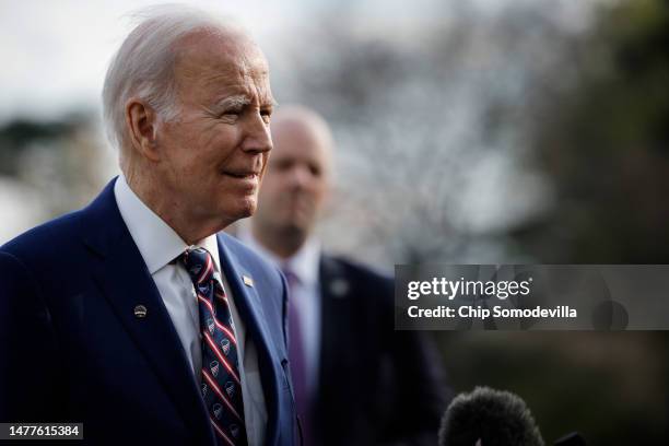 President Joe Biden briefly speaks with reporters as he returns to the White House on March 28, 2023 in Washington, DC. Biden traveled to Durham,...