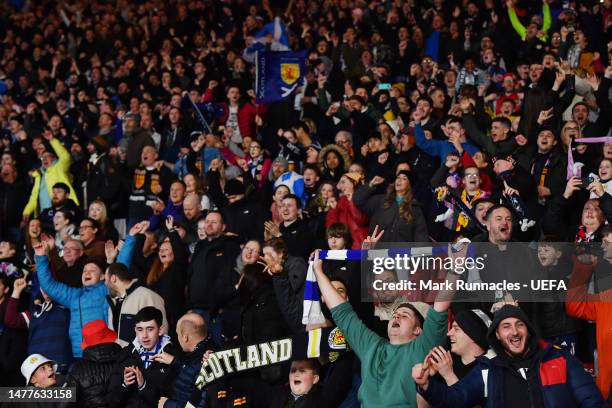 Scotland fans celebrate at the final whistle during the UEFA EURO 2024 qualifying round group A match between Scotland and Spain at Hampden Park on...