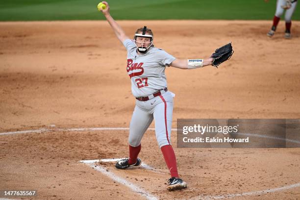Alex Salter of the Alabama Crimson Tide throws a pitch against the Tennessee Lady Vols in the first inning at Sherri Parker Lee Stadium on March 25,...