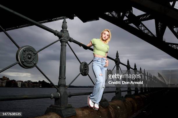 AleXa poses for a portrait underneath the Sydney Harbour Bridge at Dawes Point on March 29, 2023 in Sydney, Australia.