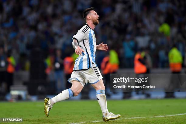 Lionel Messi of Argentina celebrates after scoring the team's fifth goal during an international friendly match between Argentina and Curaçao at...