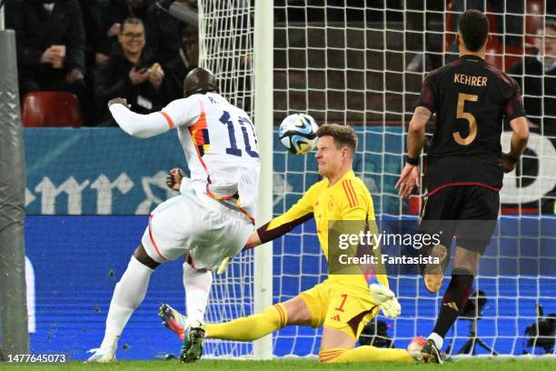 Romelu Lukaku of Belgium scores his side's second goal past Marc-Andre ter Stegen of Germany during the international friendly match between Germany...