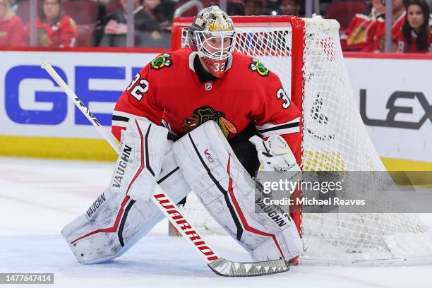 Alex Stalock of the Chicago Blackhawks tends the net against the Dallas Stars during the first period at United Center on March 28, 2023 in Chicago,...